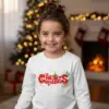 1760697297704699.png Детска коледна бяла блуза „Merry Christmas“ с празнични коледни символи- за момиче и момче